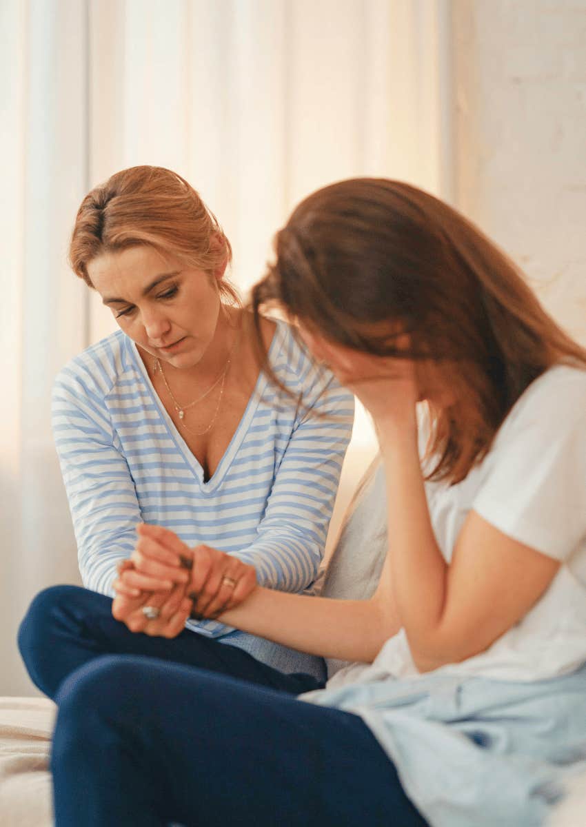 woman showing compassion to upset woman