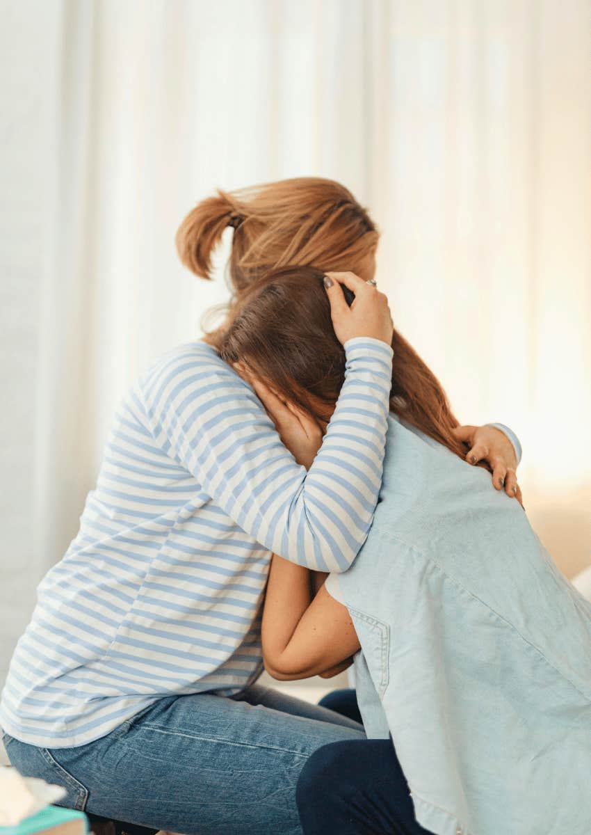 woman showing compassion to another woman