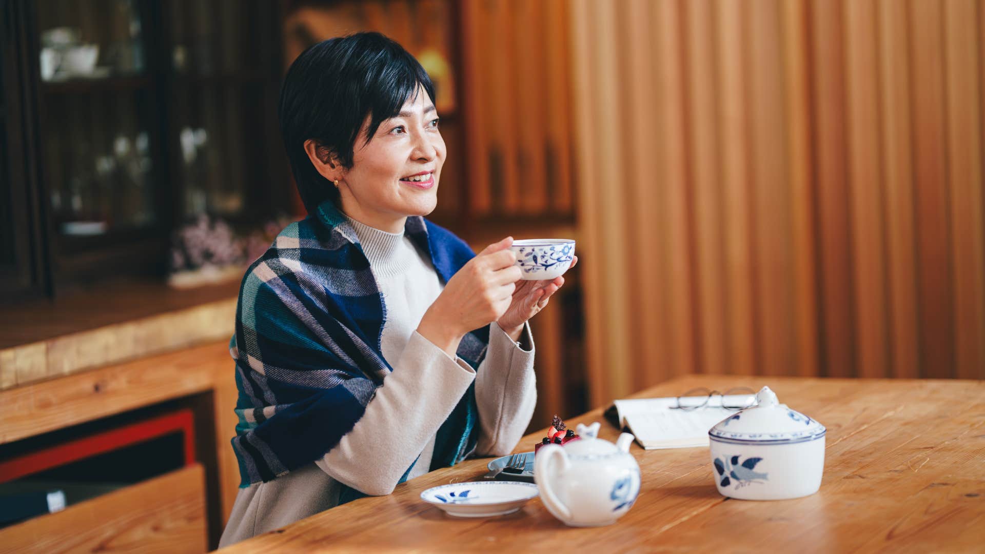 woman sipping tea enjoying her routine