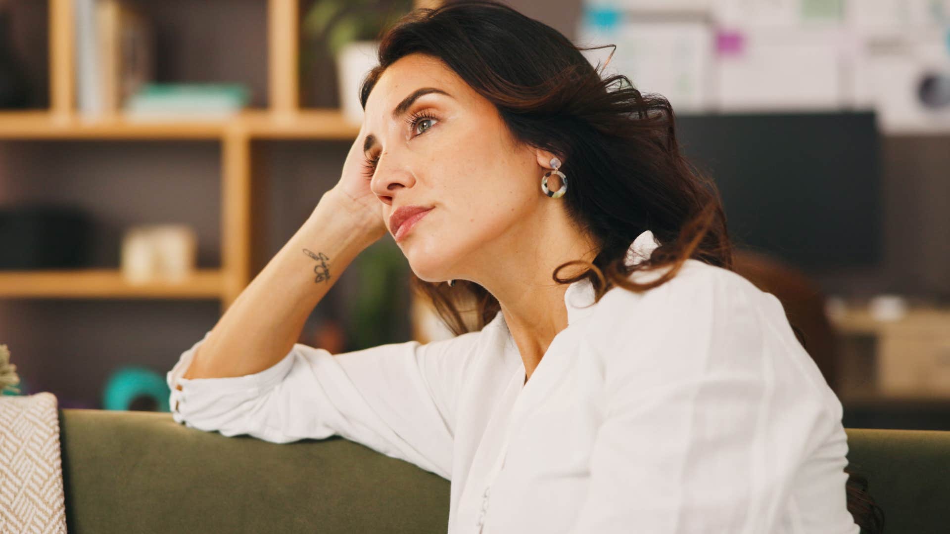 woman contemplating back-up plans sitting alone