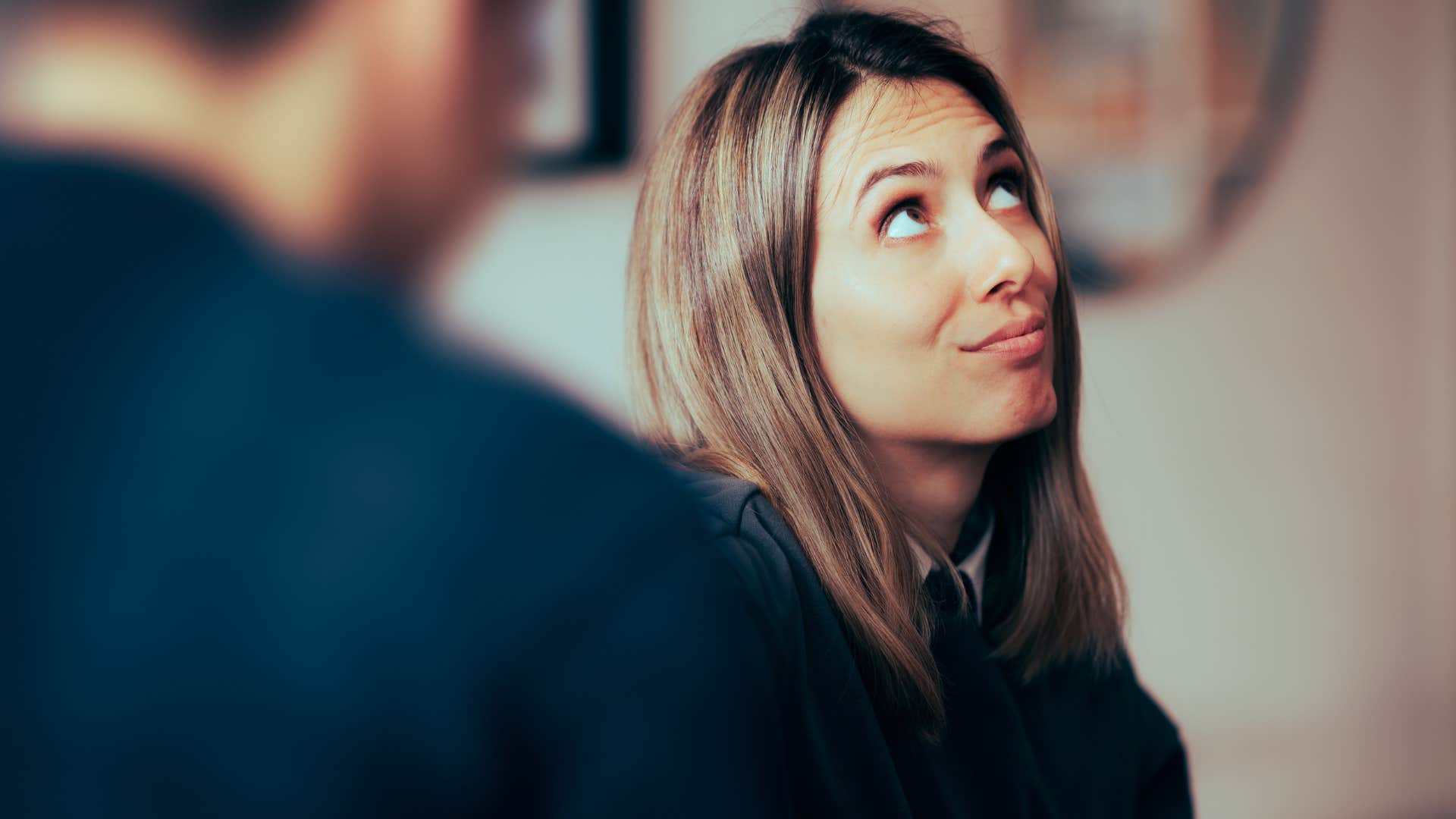 woman feigning ignorance with her husband