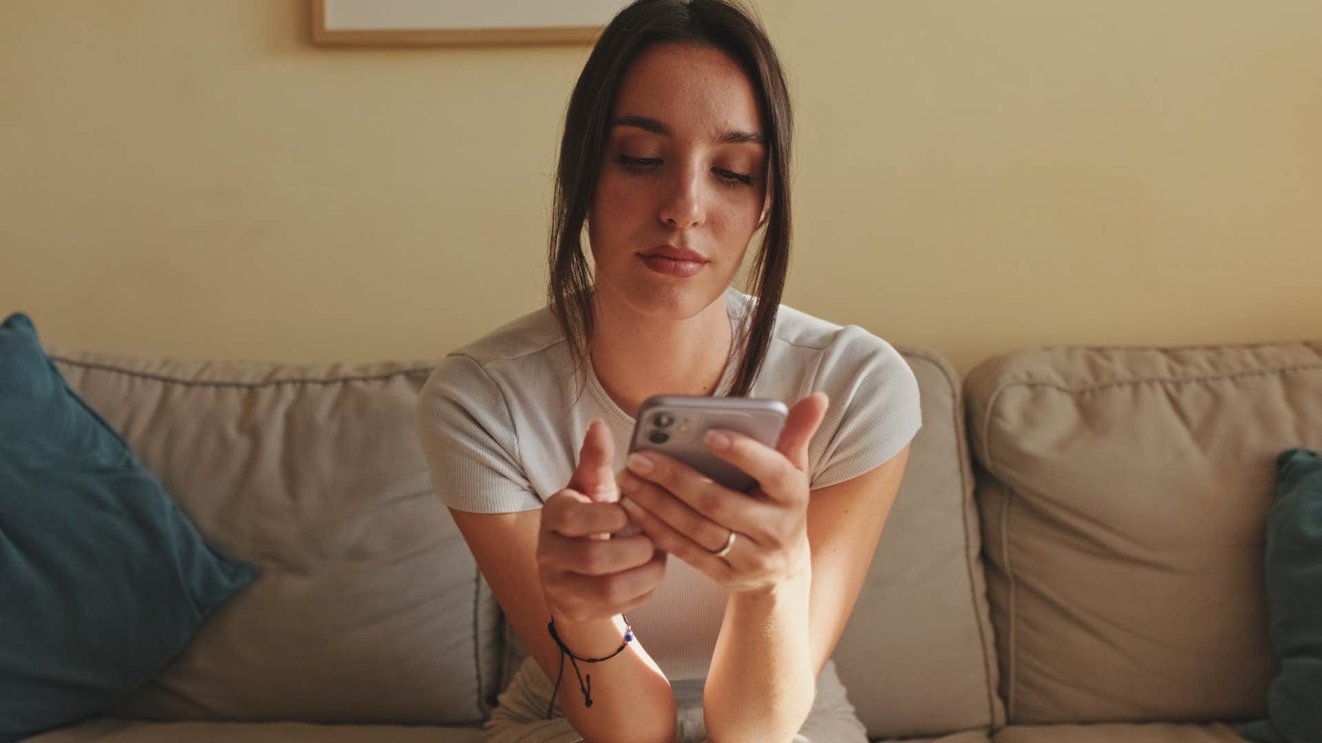 woman seeking validation while scrolling on her phone