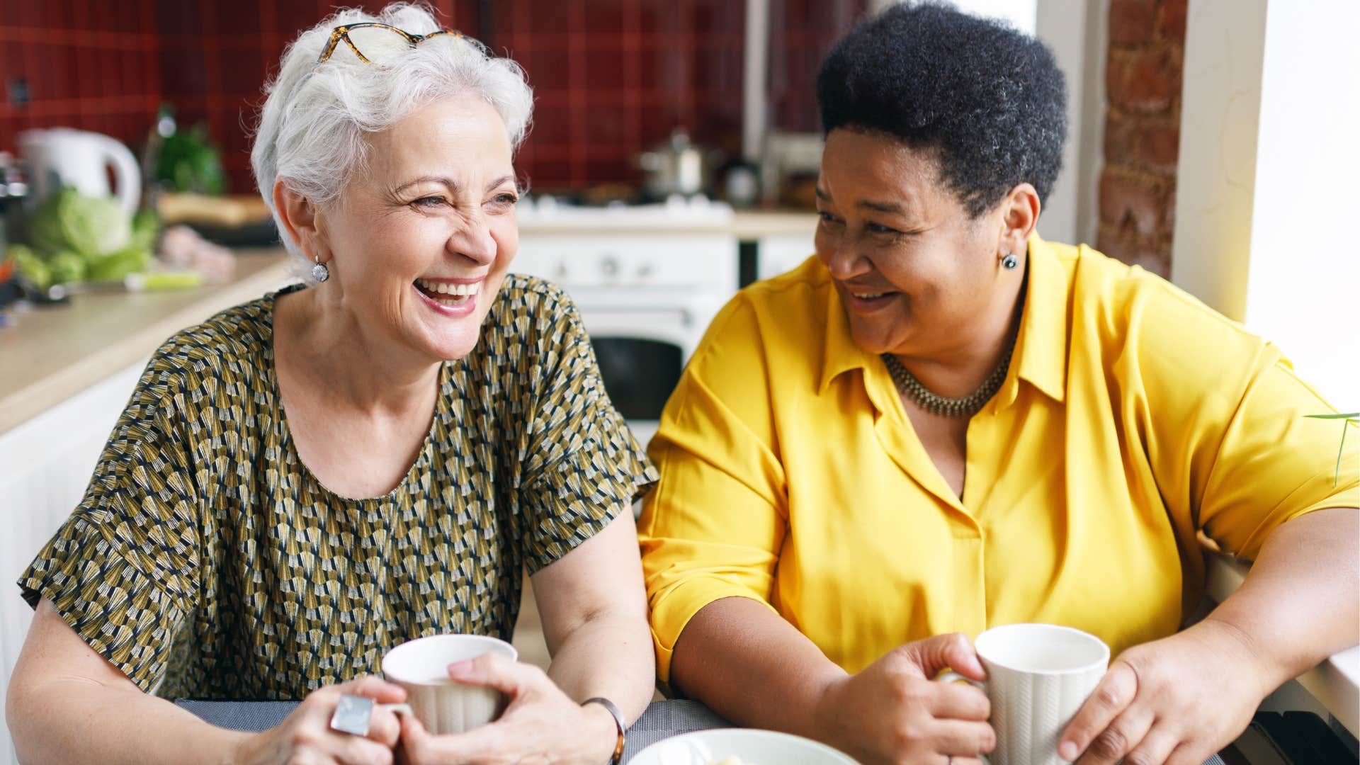 trusting best friends smiling together over coffee