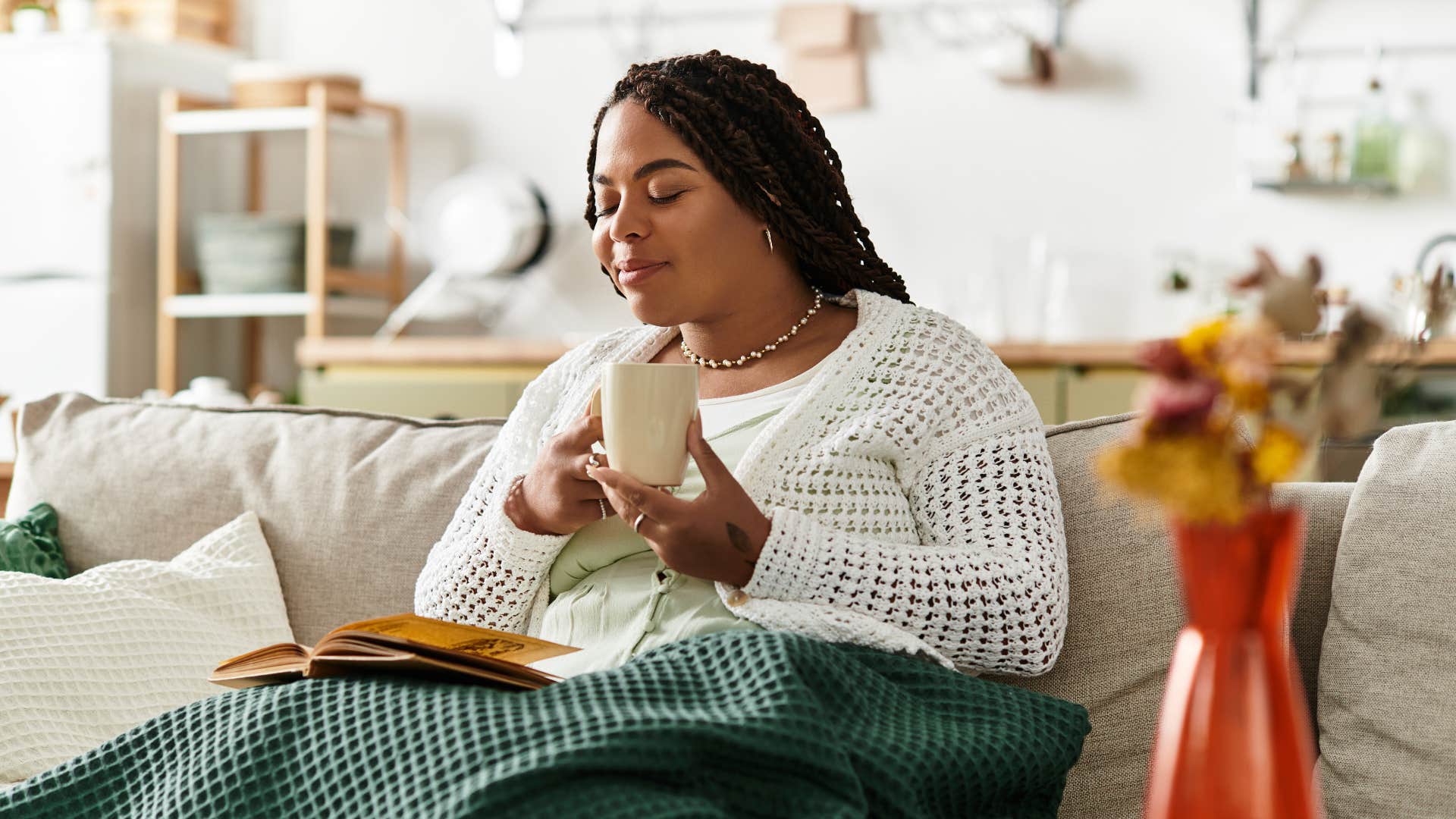 woman sitting at home in her personal sanctuary relaxing