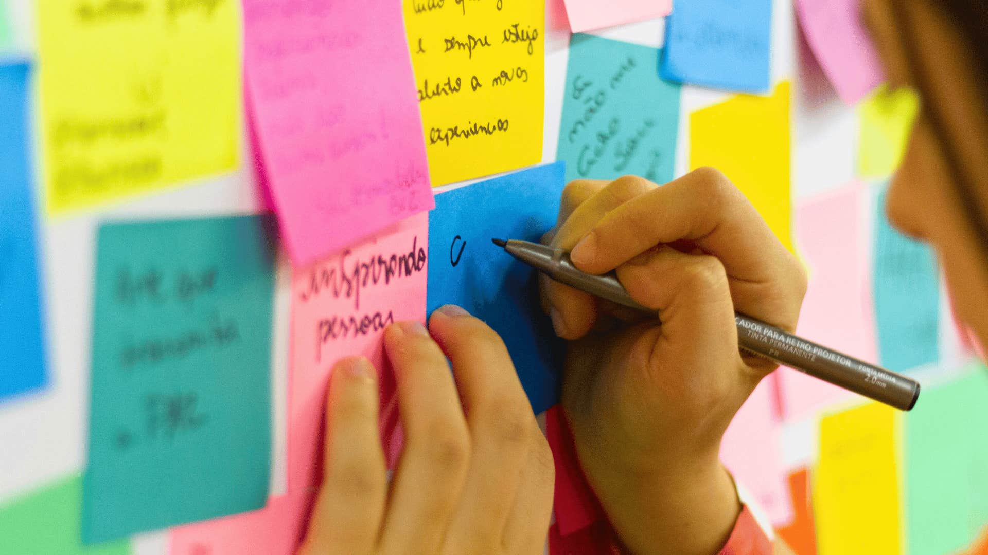 writing on sticky notes trying an advanced method