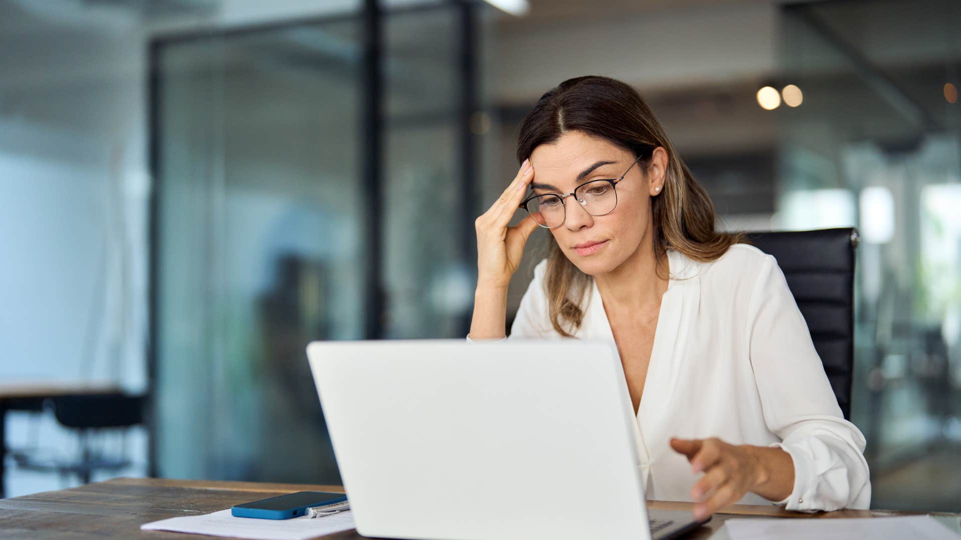 woman working on laptop in office