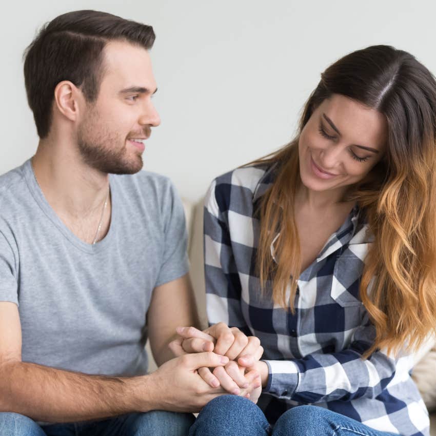 man needing praise from his wife holding his hands