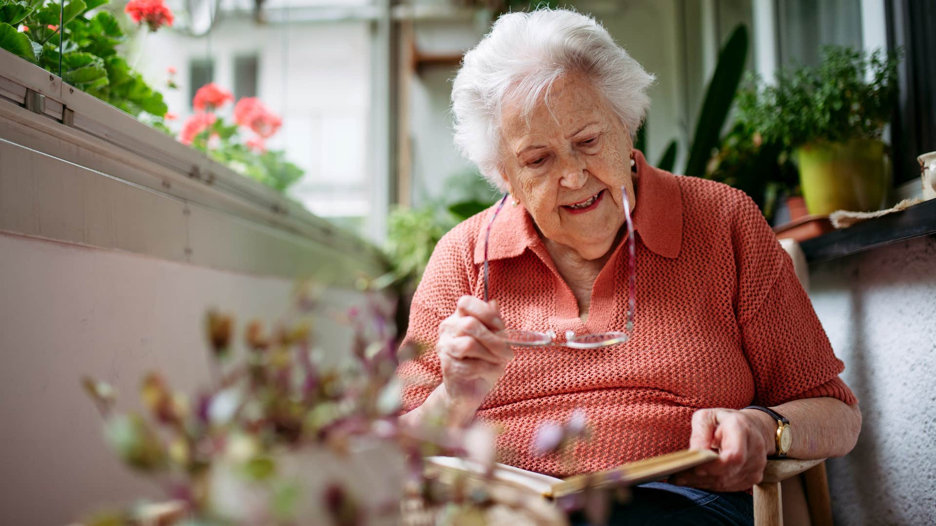 woman doing her hobbies lingering in open spaces at home