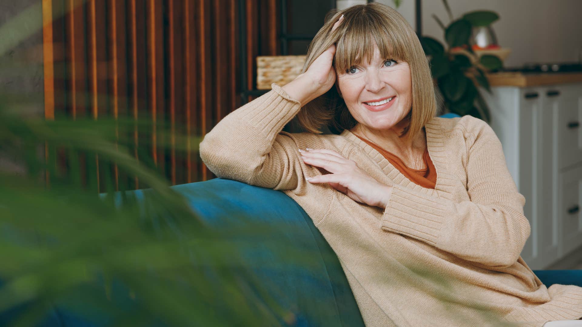 woman resting in home that has very little clutter
