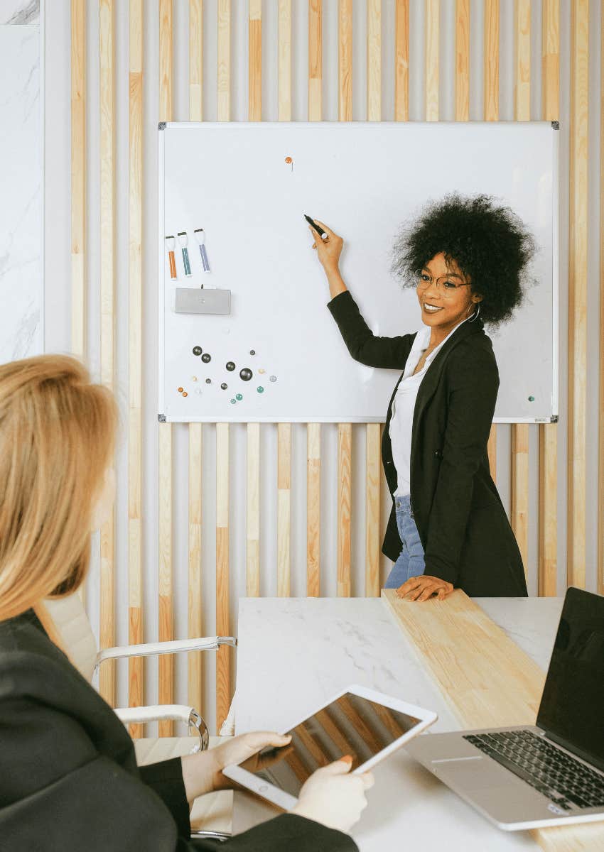 young professional woman doing a presentation
