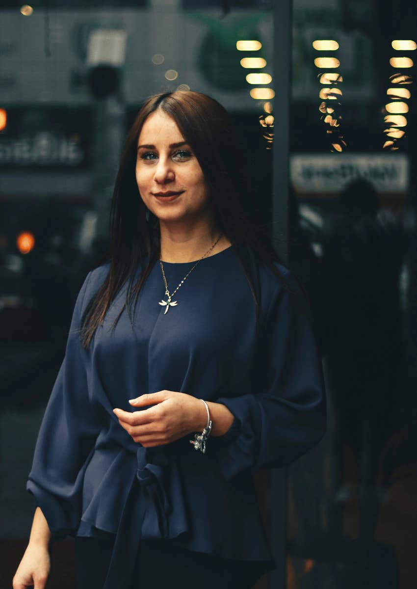 young woman concealing her hatred