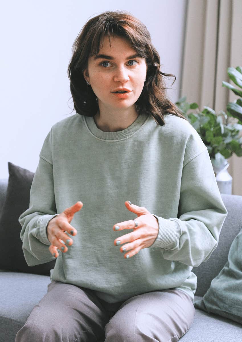 young woman in mid-conversation