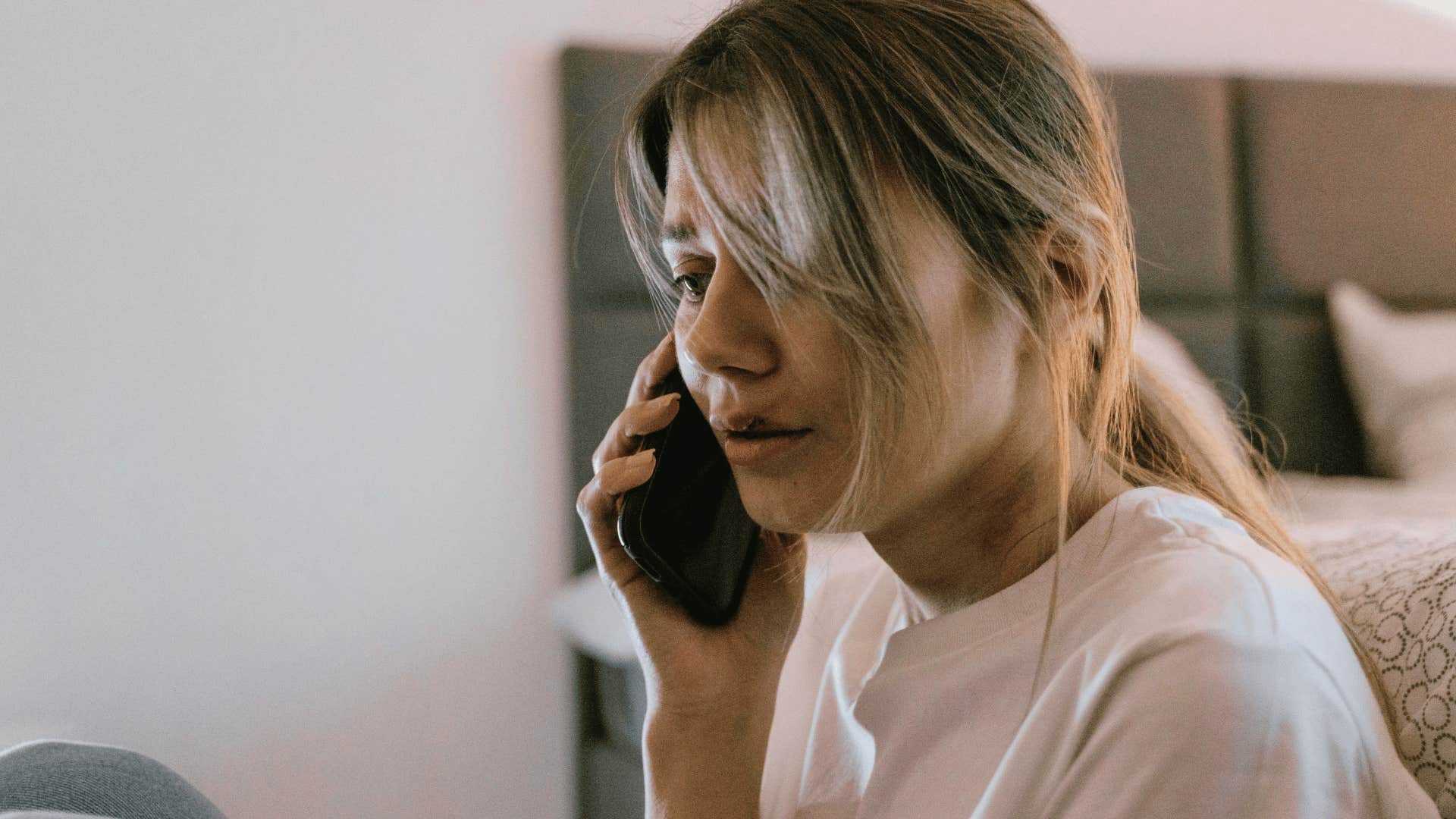 young woman reaching out for help to be unbothered