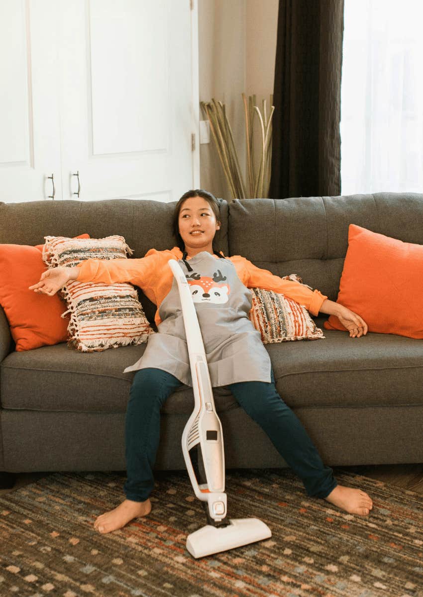 young woman satisfied with her cleaning job