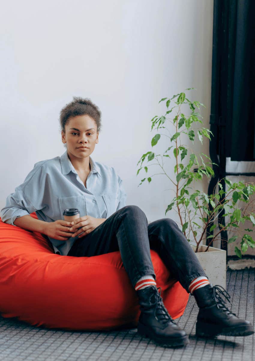 young woman sitting in a bean bag chair