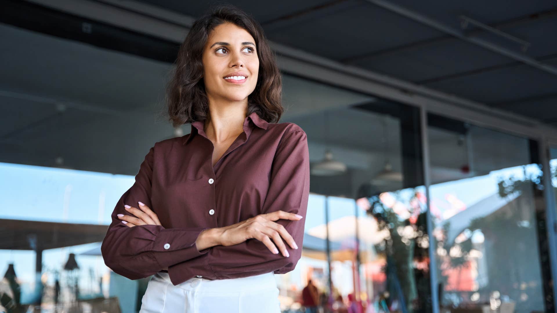 Confident person crosses arms showing values after divorce