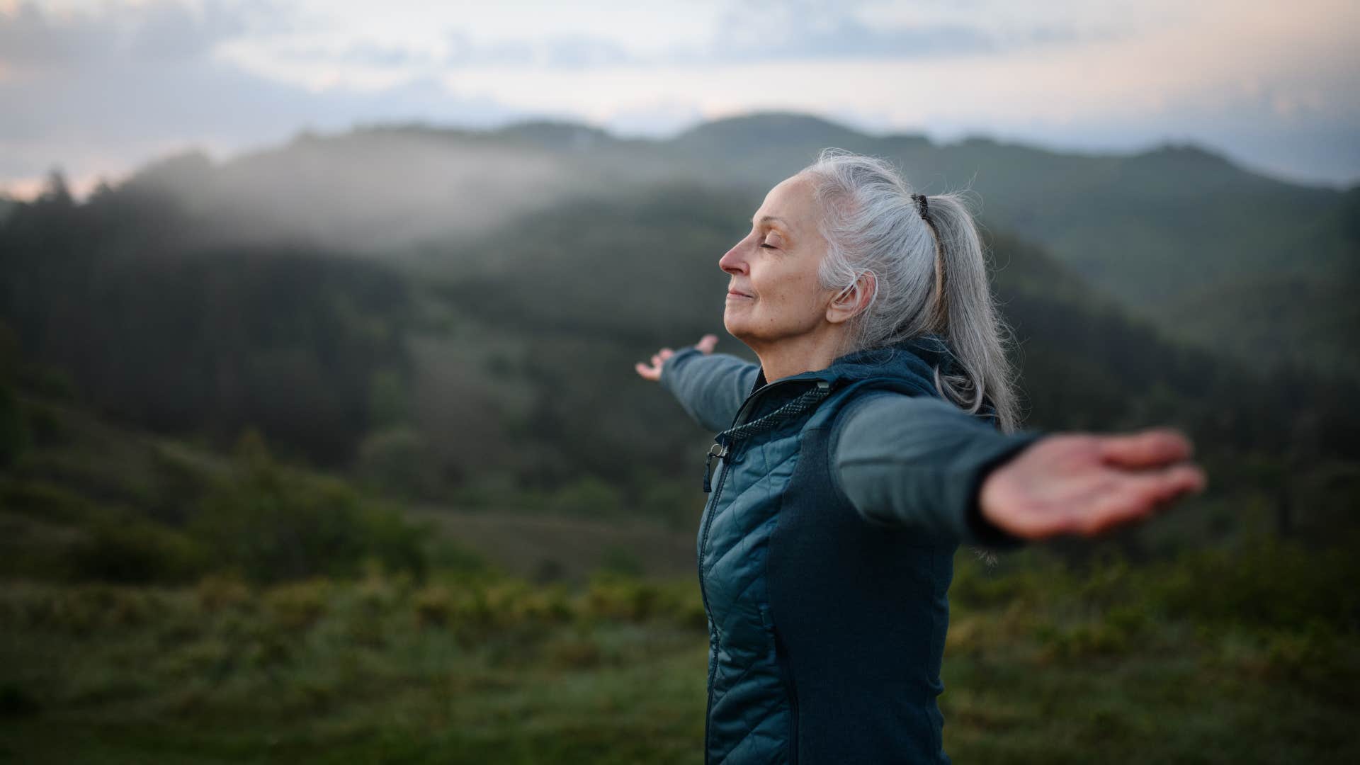 Calm person meditates in nature showing way to be better at life