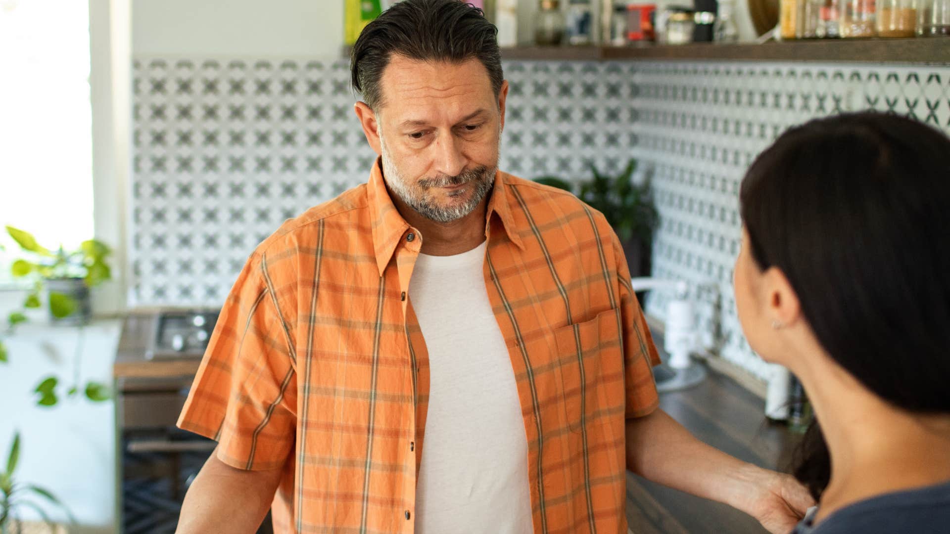 man who is struggling way more than you realizing changing the subject in a conversation at home