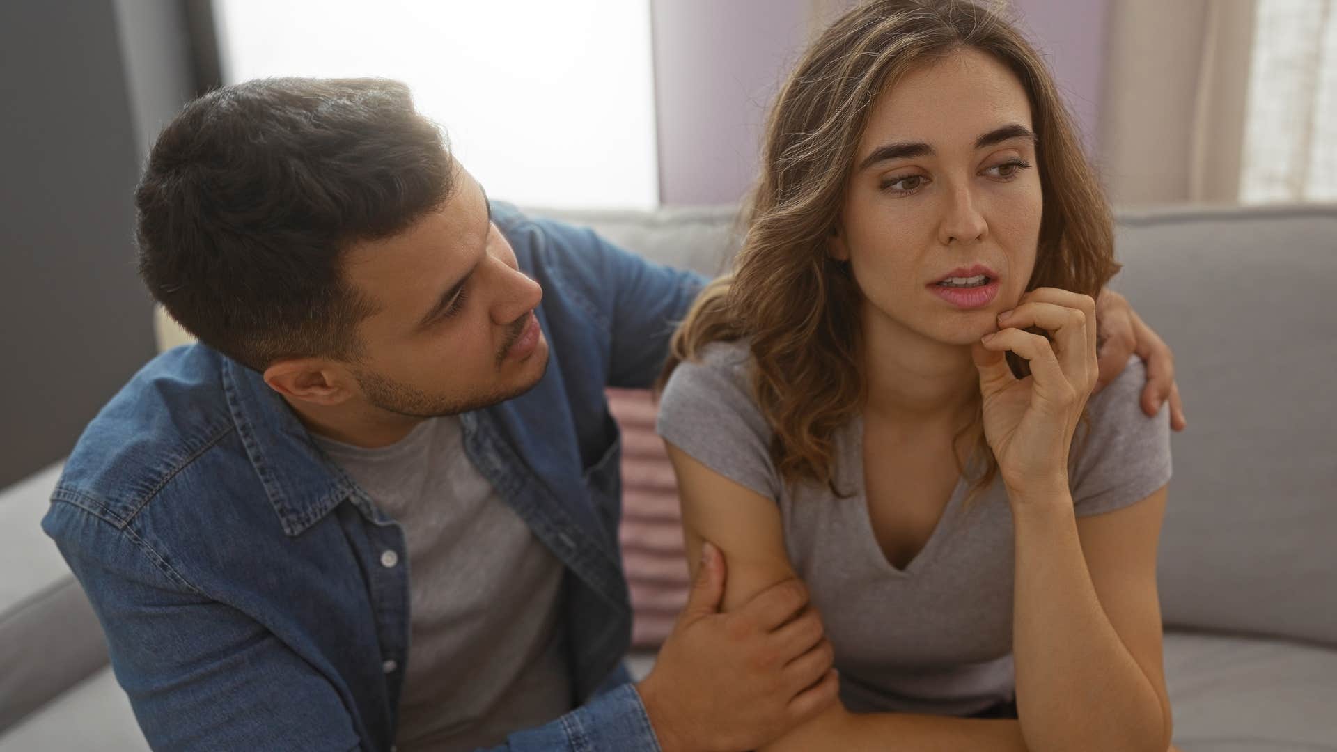 woman who over-apologizes for everything talking to a partner