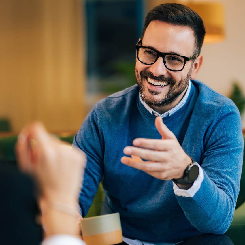 incredibly empathetic man talking to colleague