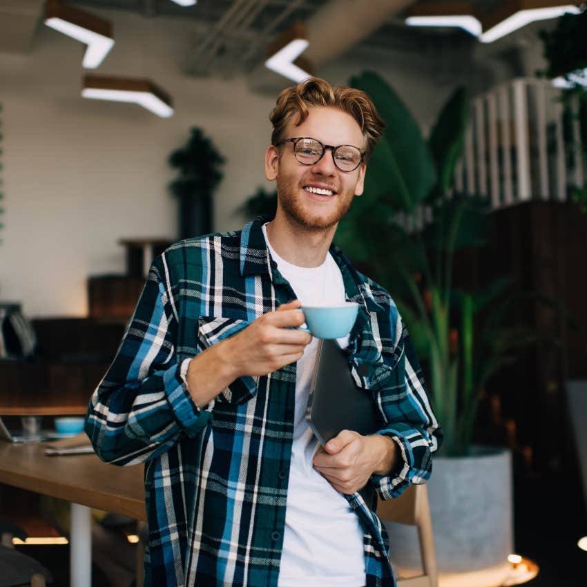 man drinking coffee before starting work