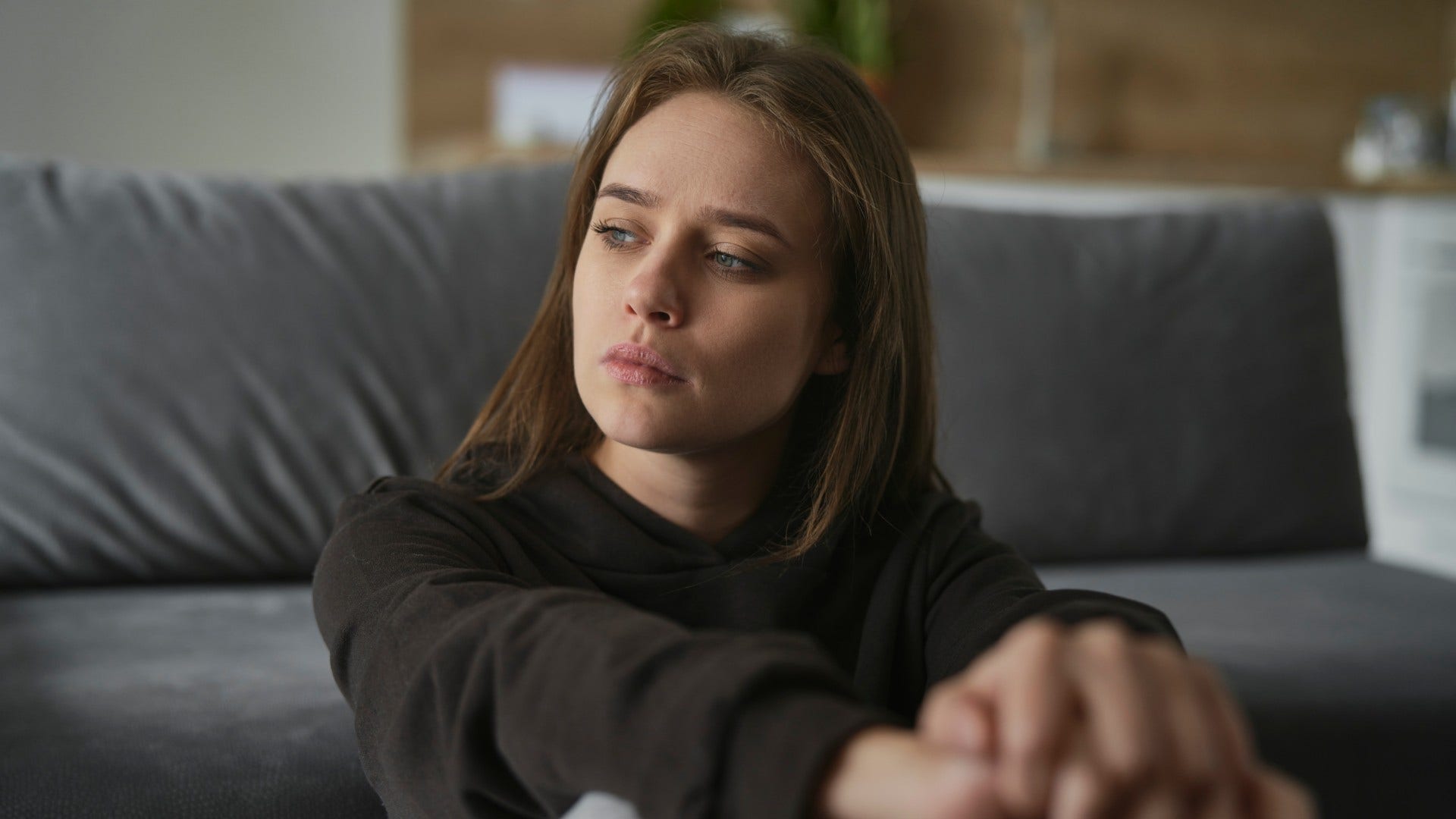 woman who feels anxious in love and makes it worse by adding anxiety-inducing activities