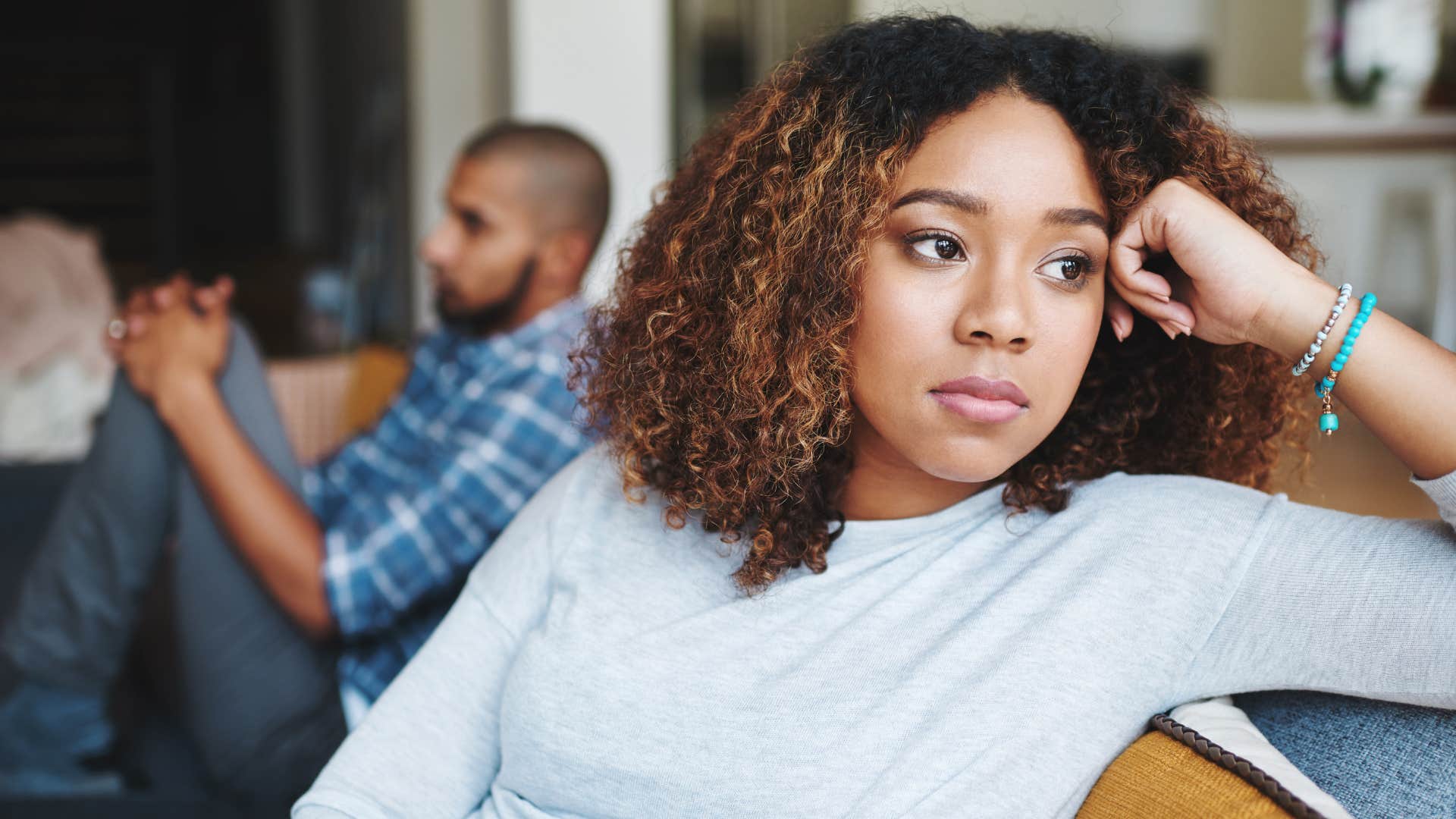 unhappy woman no longer talking about the future with partner