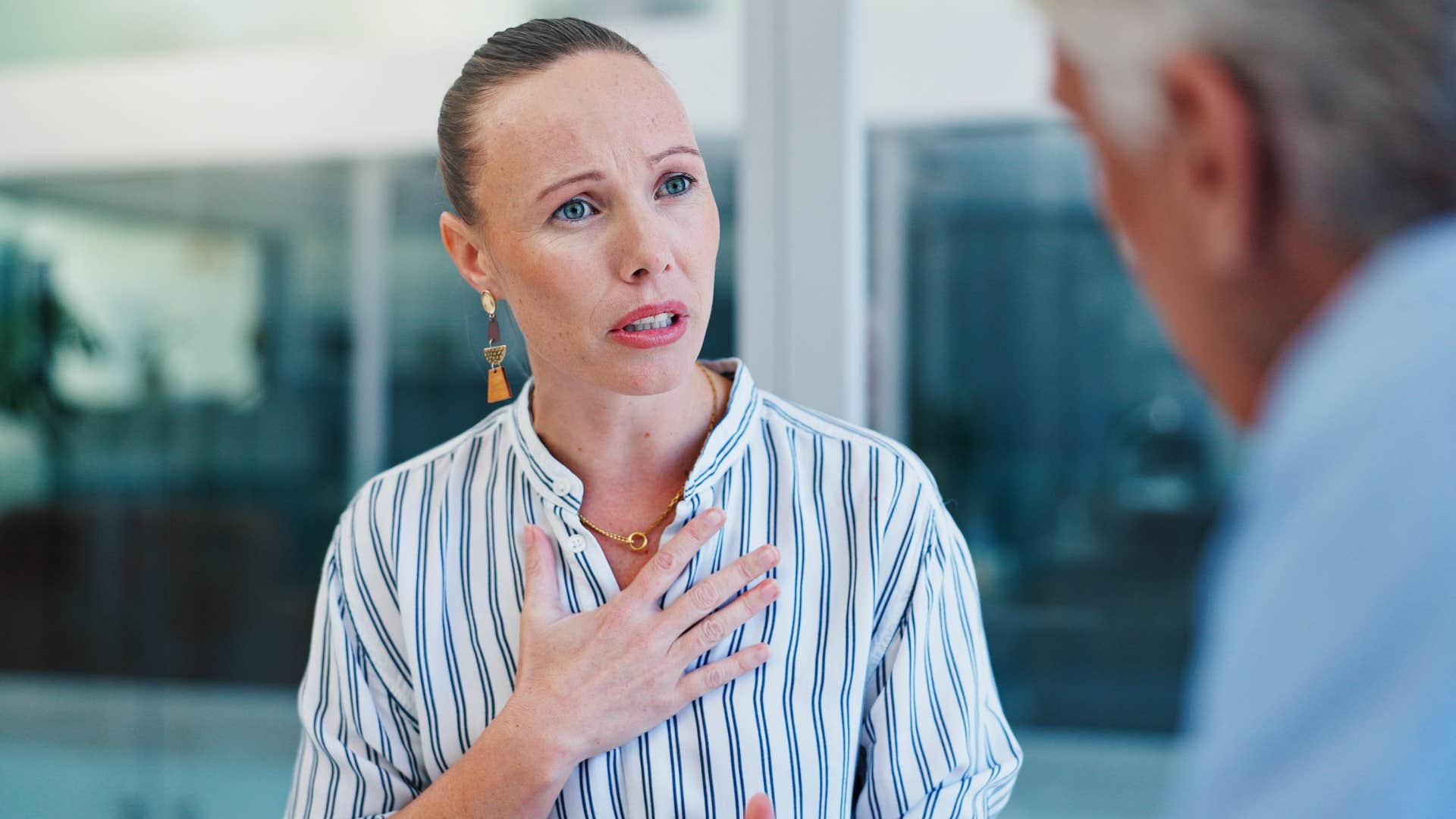 annoyingly stubborn woman telling colleague that's just how i am