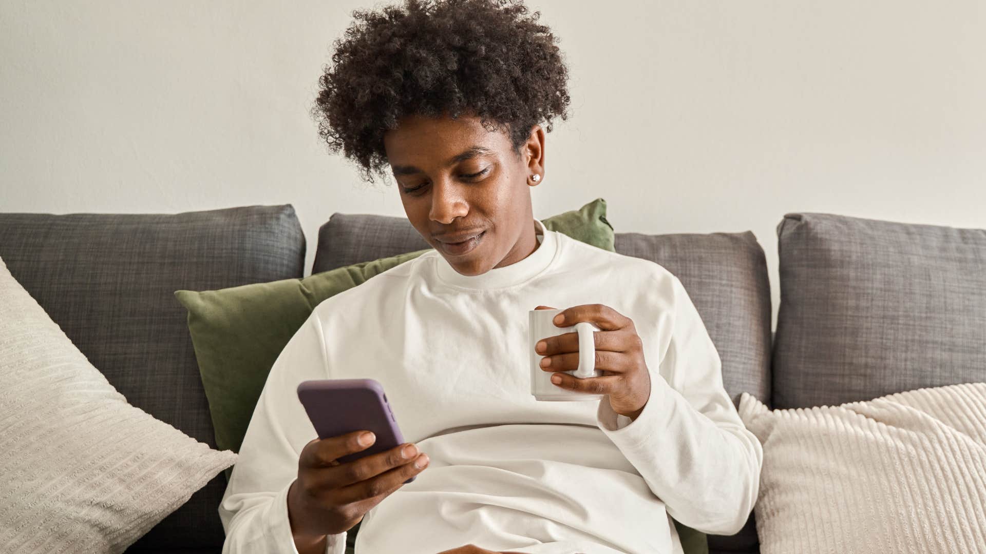 Gen Z person texting instead of calling on their phone