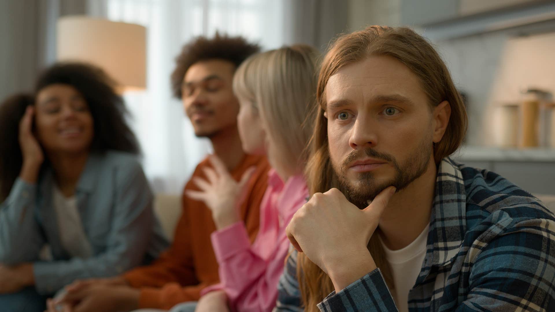 lonely sad man hanging with friends to avoid solitude