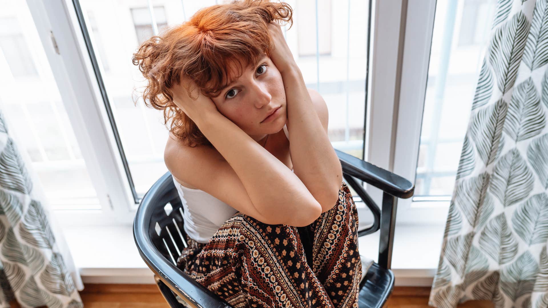 sad woman who is not okay dealing with the reality of adulthood