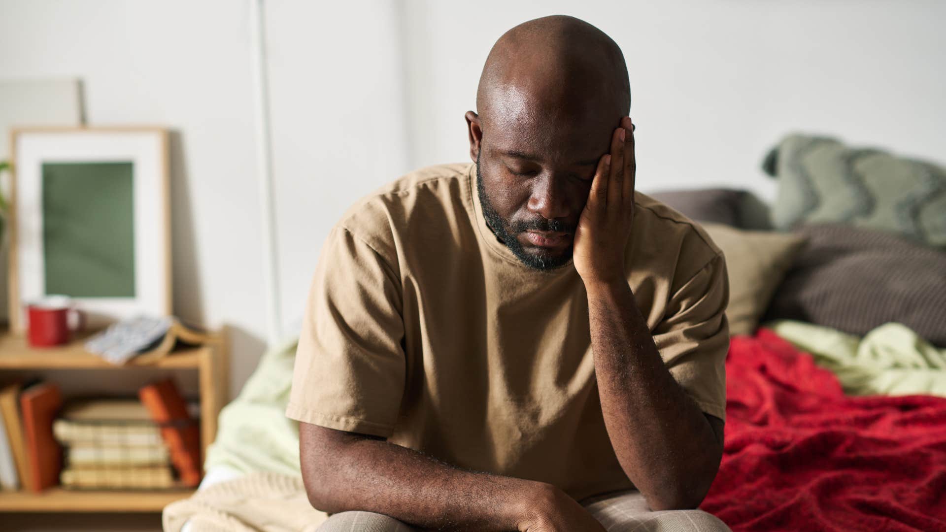 tired man after not getting enough sleep the night before