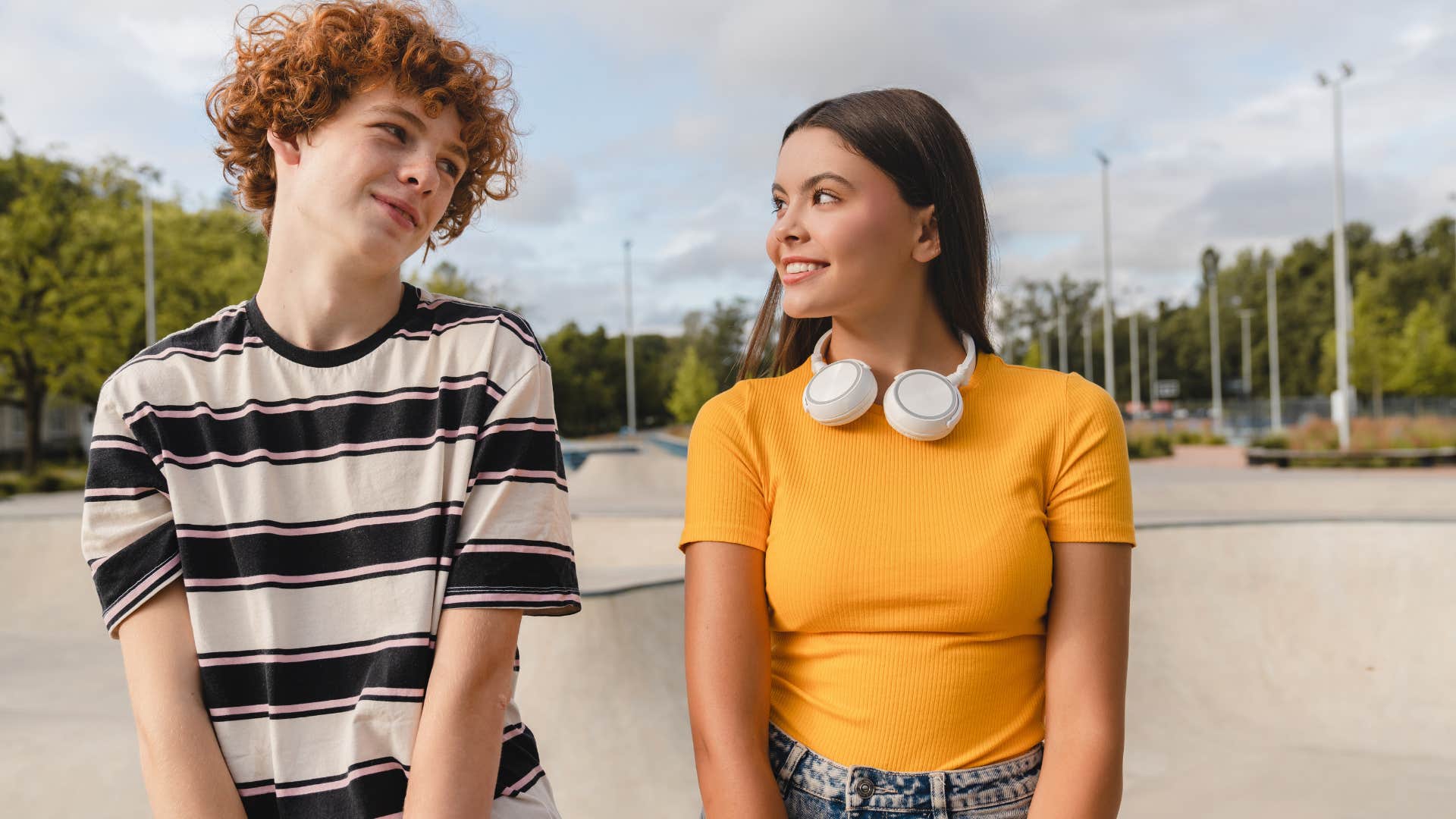 Cute couple makes eyes at each other showing appreciation for time together