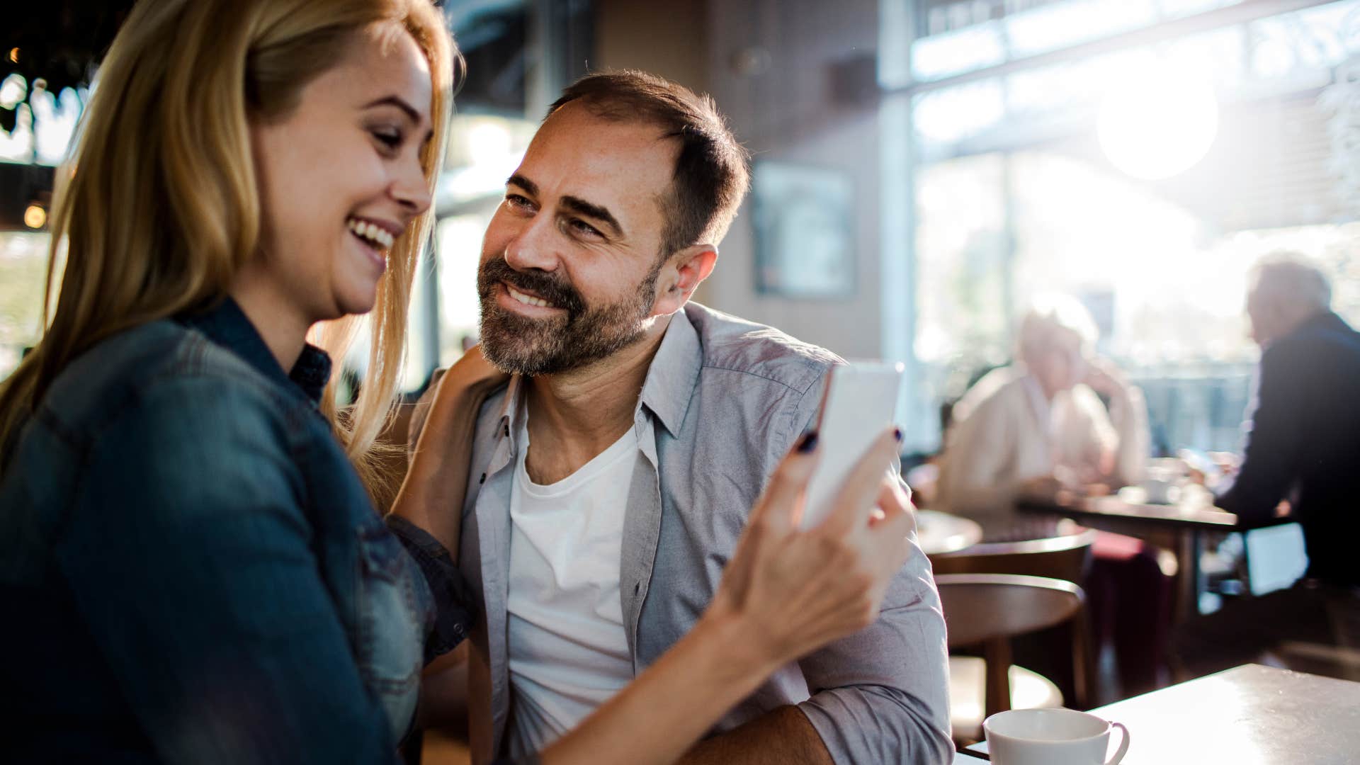 Happy couple smile and touch showing gratitude is big deal
