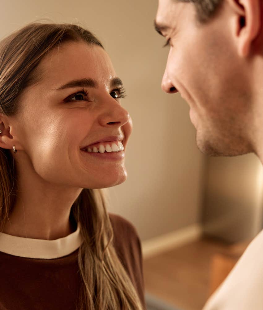 Happy couple hold eye contact 