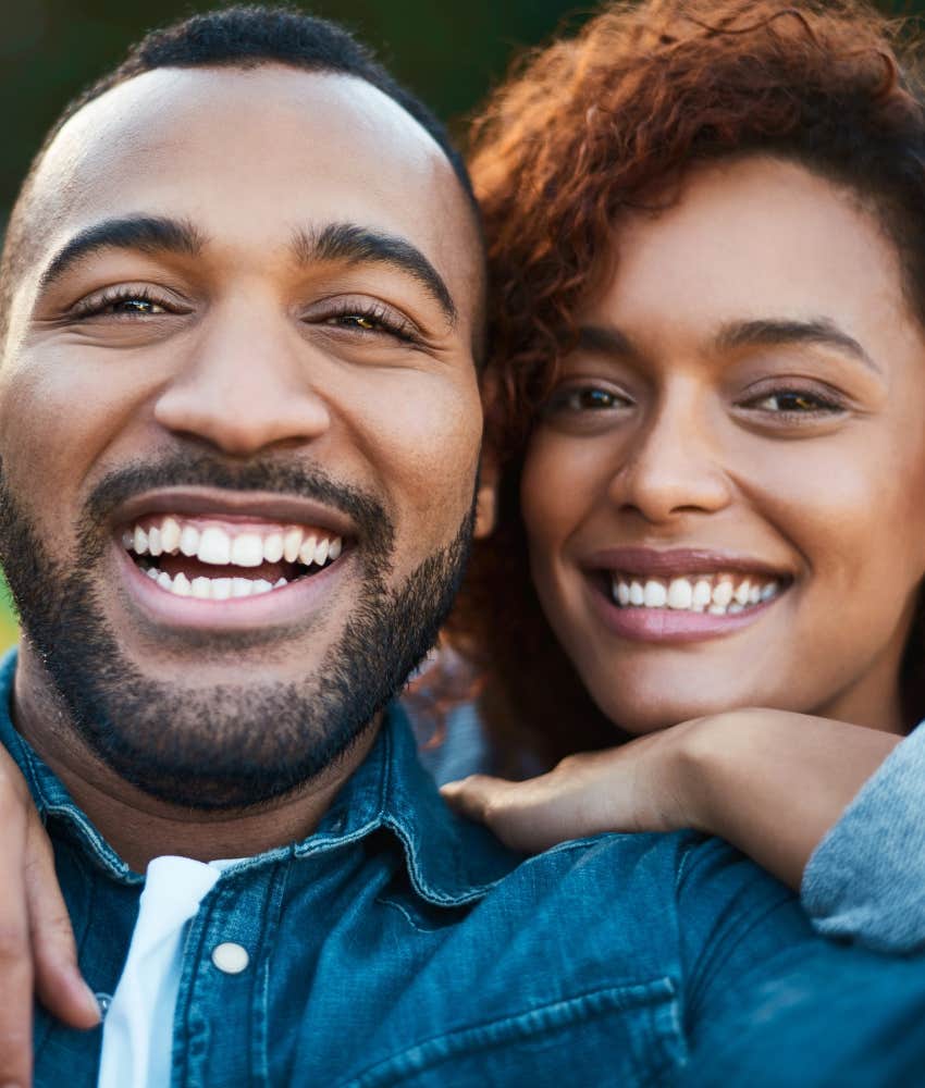 Loving couple share happy moment showing they fell safe in relationship