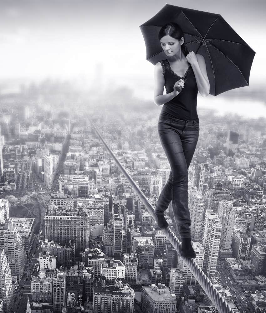 Courageous person calmly walks tightrope high above city showing more peace