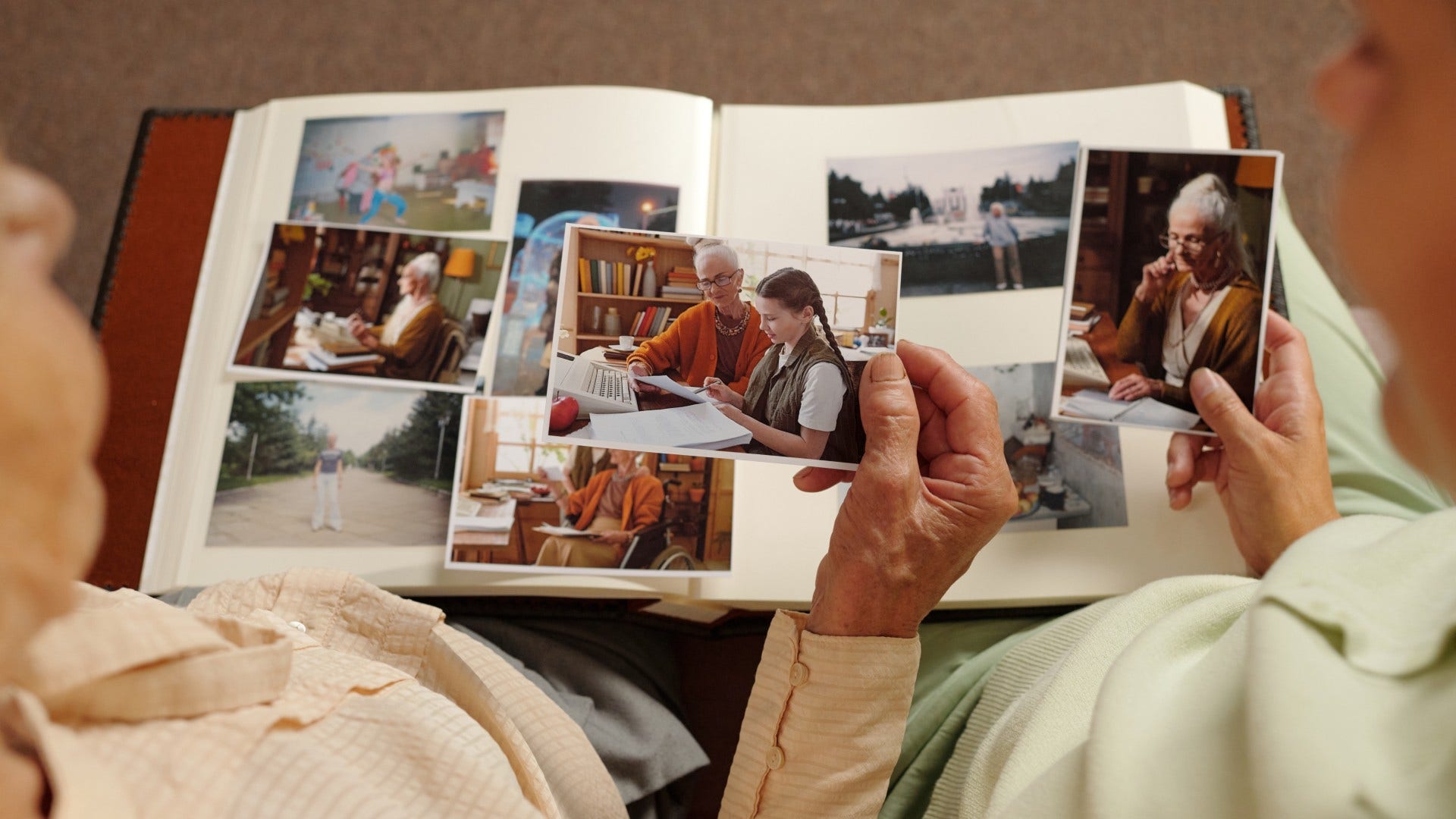 sentimental people holding onto photographs