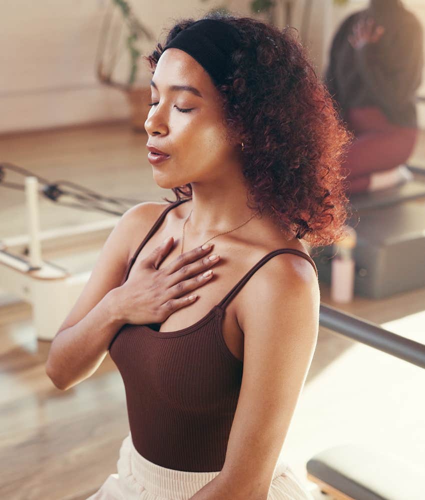 Confident person places hand on chest to notice body