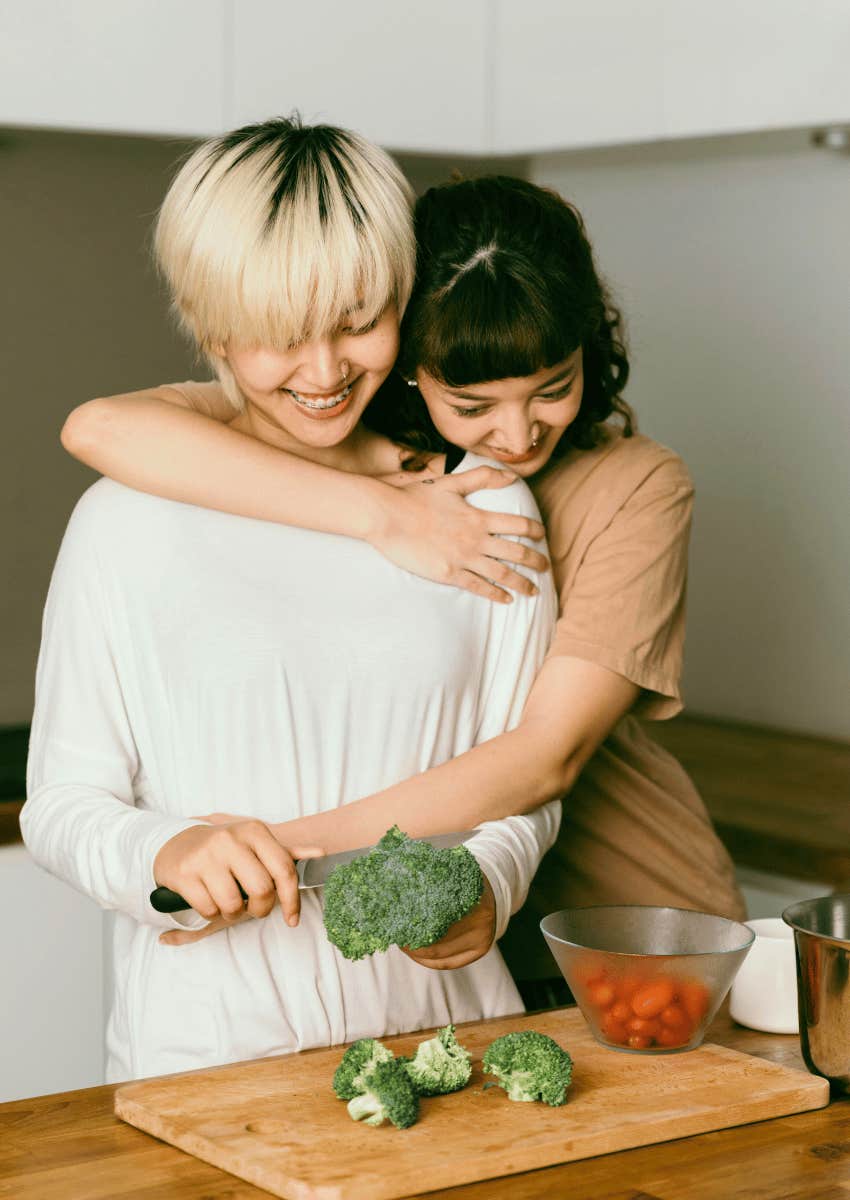 couple hugging in the kitchen