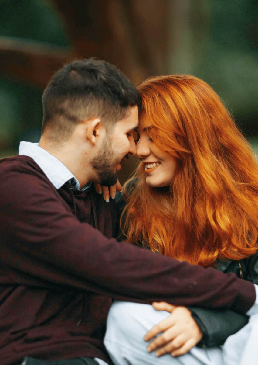 loving couple touching foreheads
