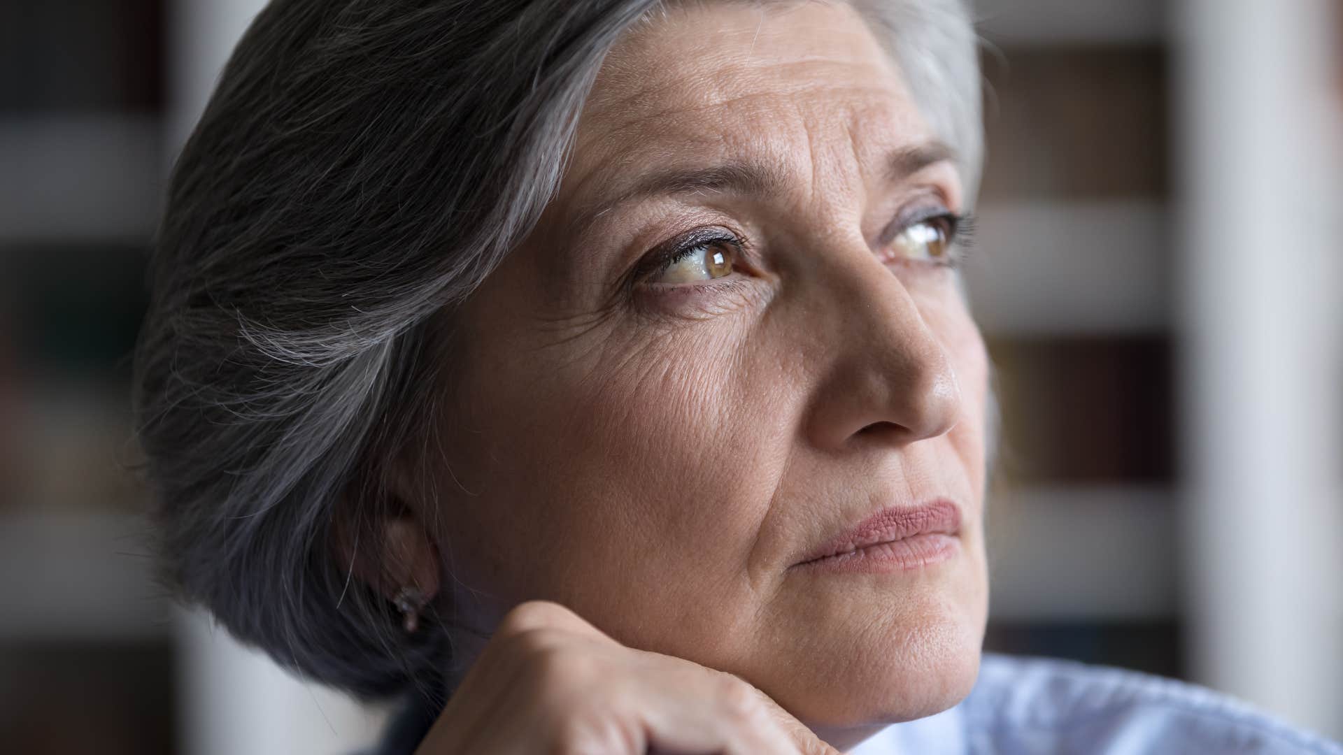 Woman who predicts the future sitting at home.