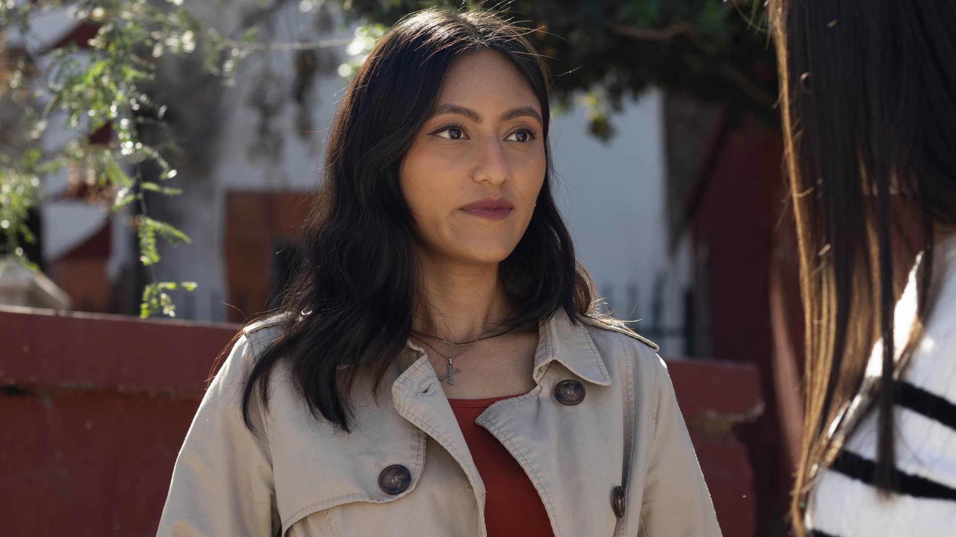 Woman who regulates themselves amid conflict talking to a friend.