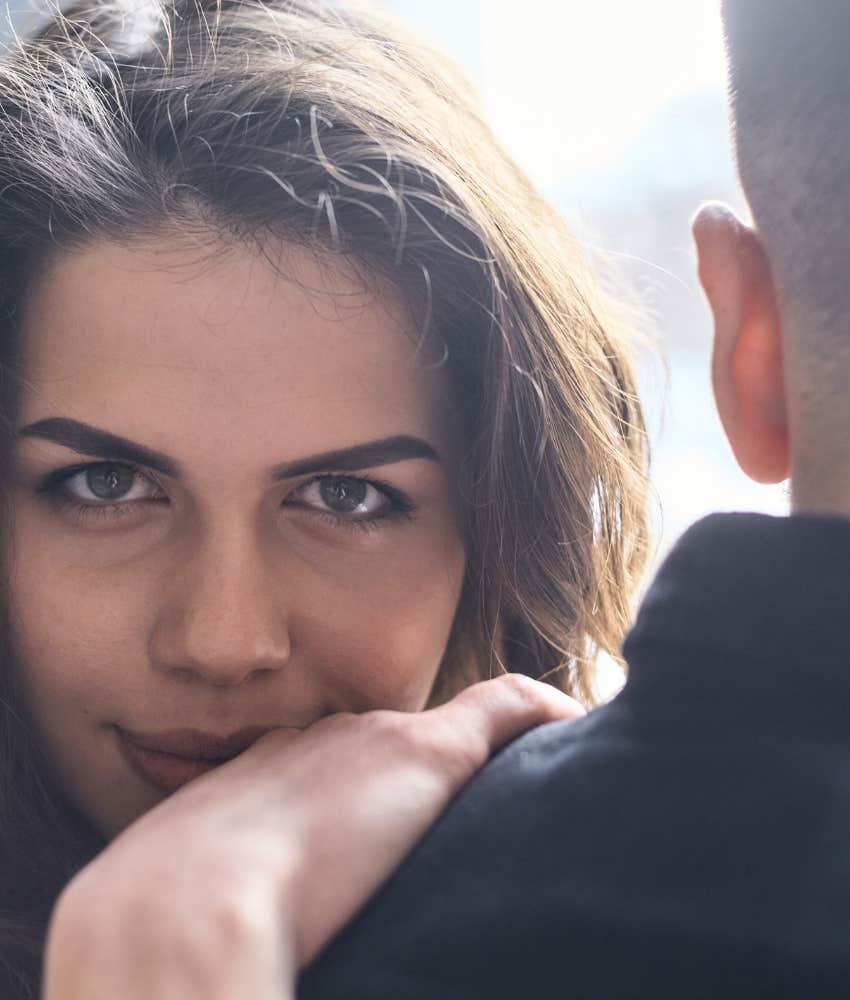 Divorced person leans on new partner's shoulder showing they replace their ex