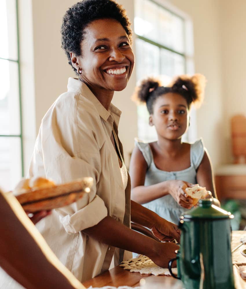 Happy mom and kids prepare food showing better parent after divorce