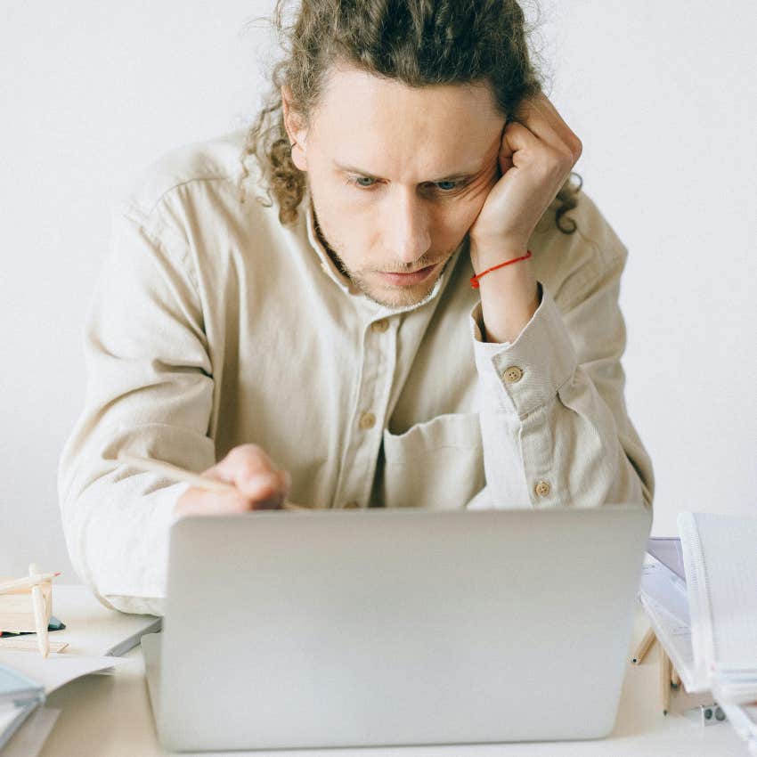 employee sitting at his desk