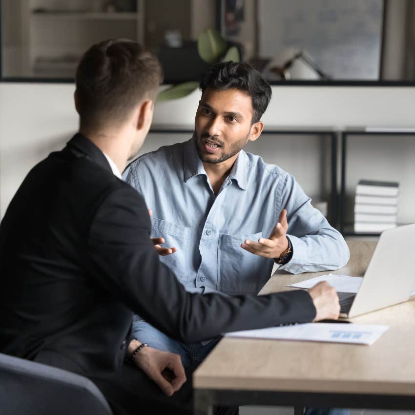 man asking about benefits during job interview
