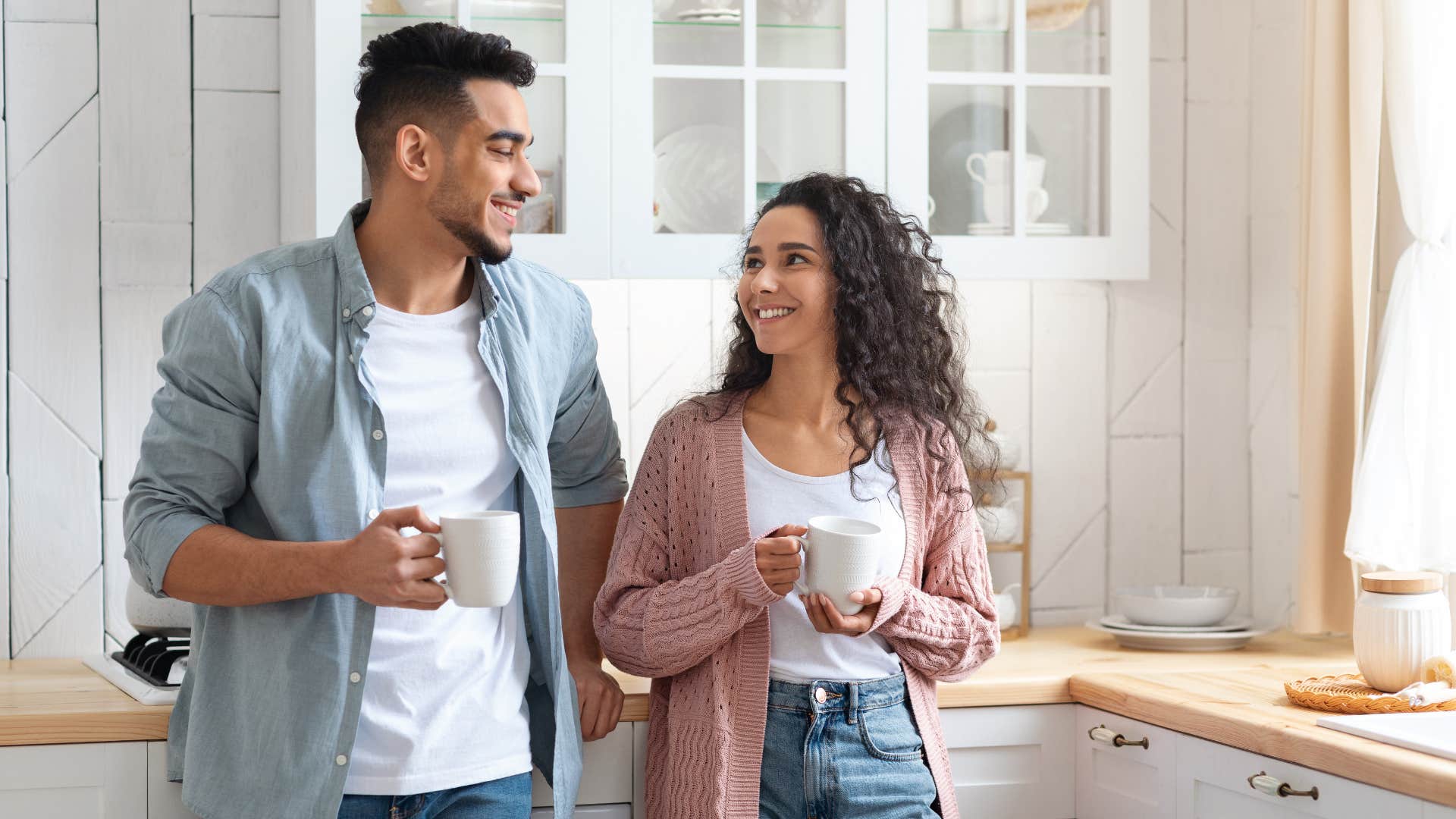 Happy couple share coffee and smiles showing appreciation makes relationship happier