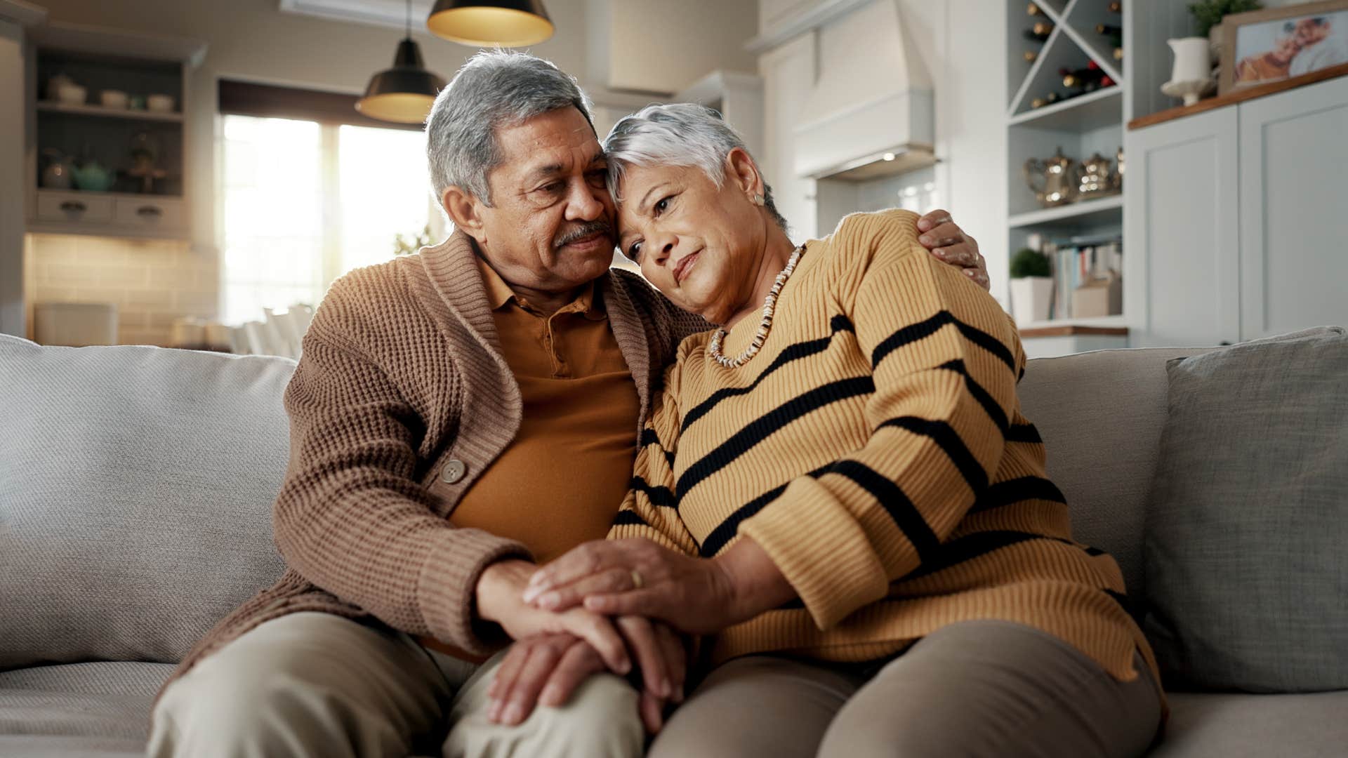 Loving person embraces partner showing secure happy relationship