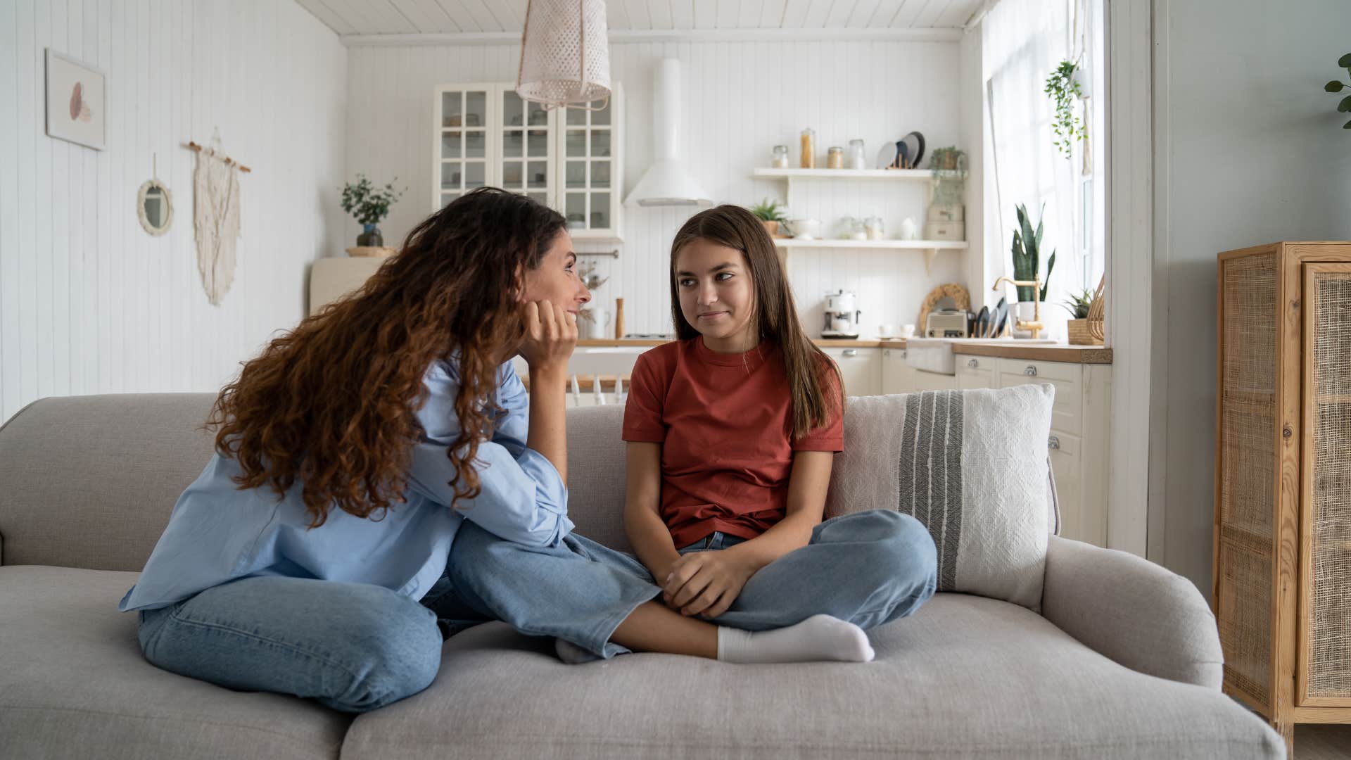 mom having conversation with teen daughter